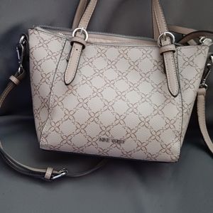 Women's beige Nine West purse.